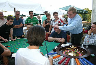 Roulette table for a company summer party Guests at a company summer party play roulette