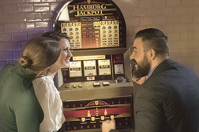 Man playing a slot machine
