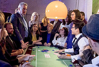 All in at the poker table Player stands up at the poker table during all in