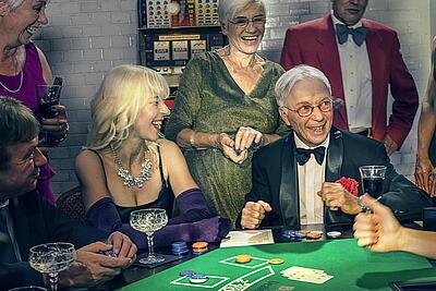 Guests have fun playing blackjack.